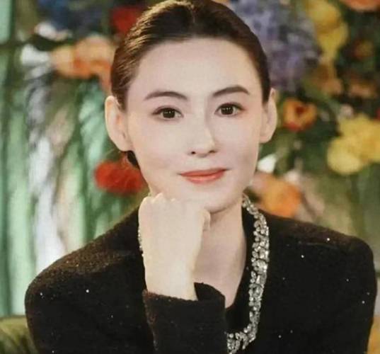 新澳门今晚开奖结果号码查询表和张柏芝近照撞脸向太与张柏芝像